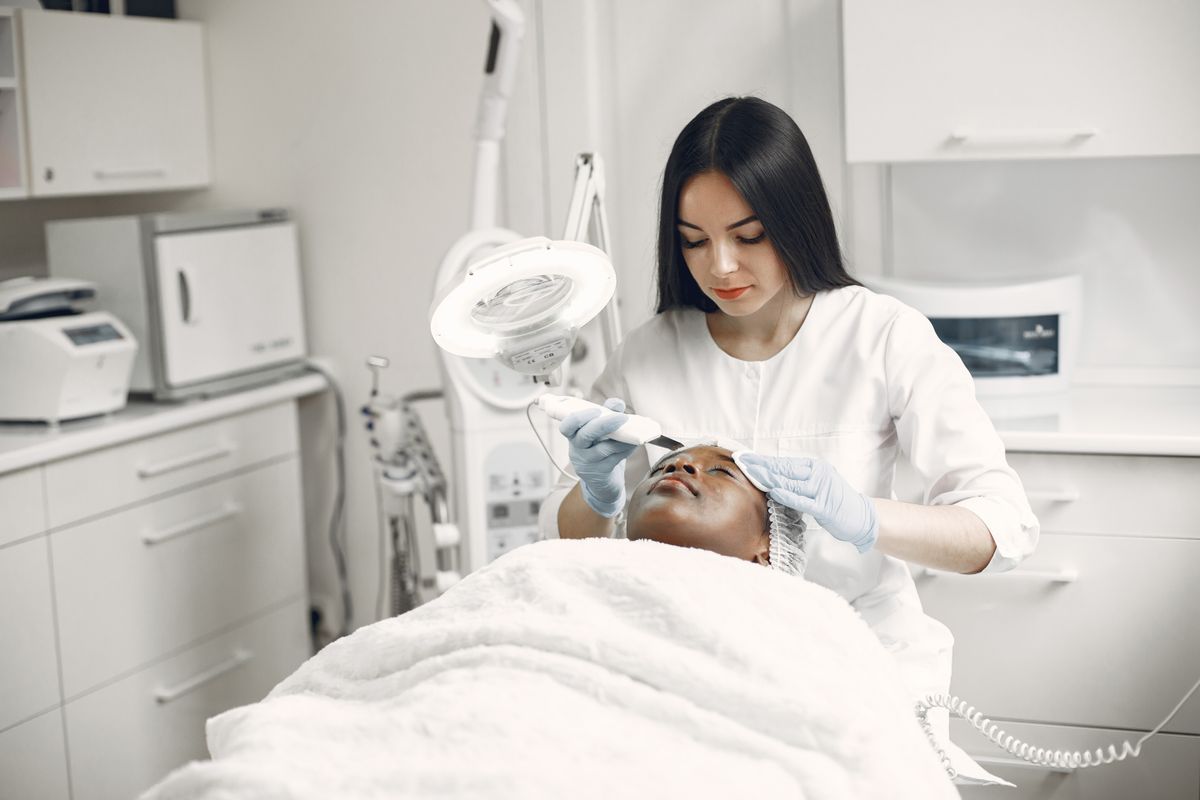 Consultation-led skin texture treatment scene.