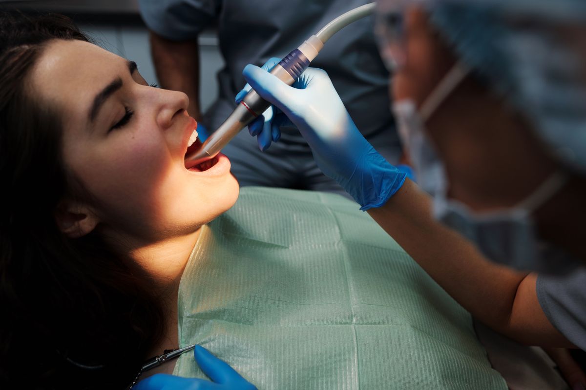General dentistry consultation scene showing dentist and patient interaction.