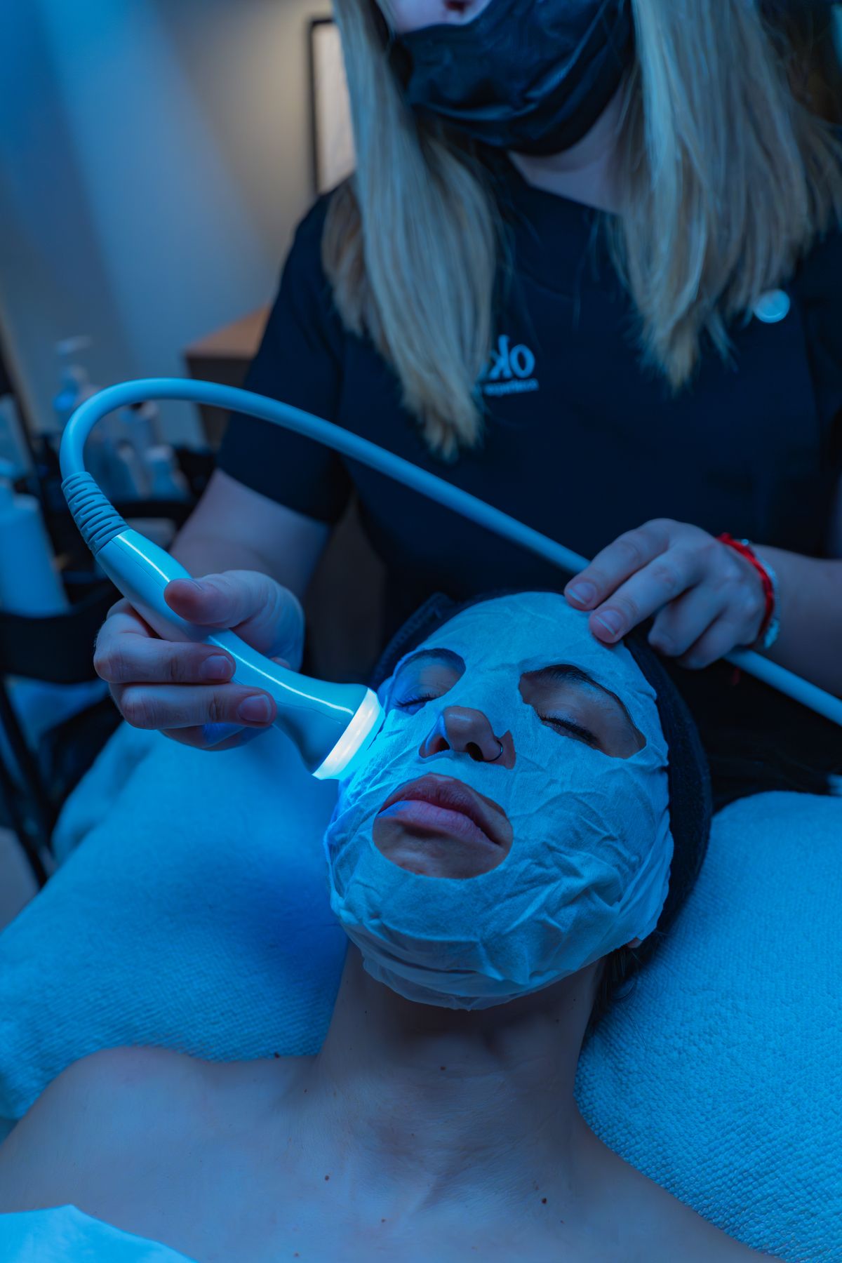 Facial treatment scene focused on cleansing and hydration support.